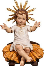 GESU' BAMBINO VESTITO IHS SEDUTO SU CULLA
